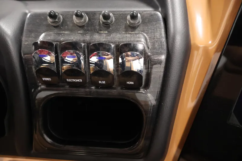 Slide: The Image of 2026 Bentley Pontoons Elite 253 Swingback Tri-Toon deck with dual captain chairs. - 24