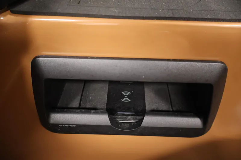 Slide: The Image of 2026 Bentley Pontoons Elite 253 interior with dual captain chairs and swingback seating. - 26