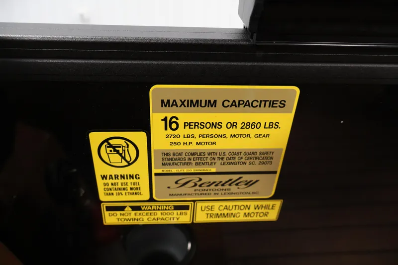 Slide: The Image of Close-up of a Bentley Pontoons Elite 253 Swingback 2026 wireless charging pad. - 27