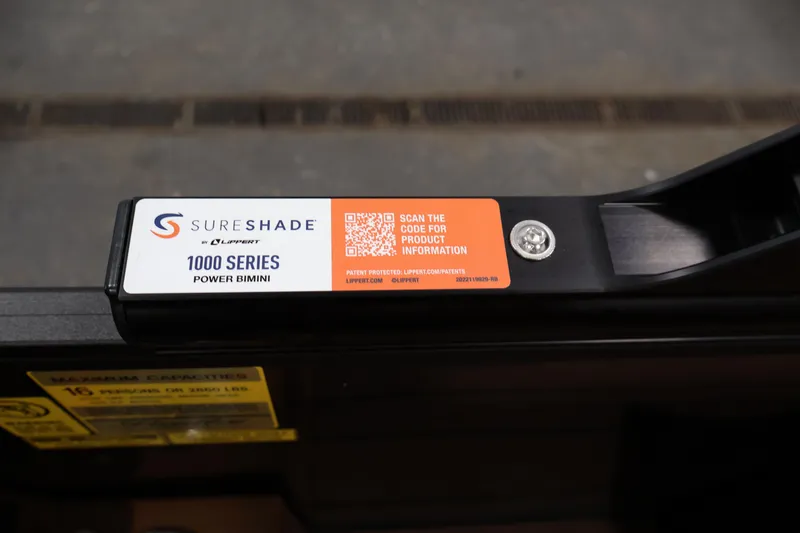 Slide: The Image of Steering wheel of 2026 Bentley Pontoons Elite 253 Swingback Tri-Toon boat. - 28