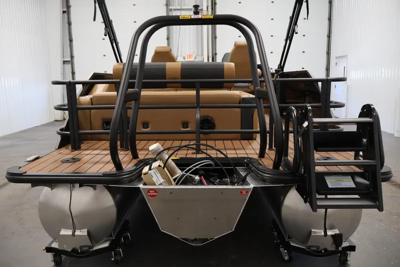Slide: The Image of 2026 Bentley Pontoons Elite 253 interior with luxurious dual captain chairs and stylish design. - 5