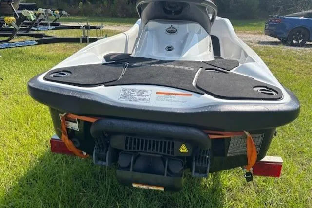 Slide: The Image of 2010 Sea-Doo GTX 155 jet ski on grass, rear view. - 10