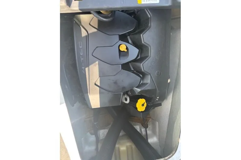 Slide: The Image of Engine compartment of a 2010 Sea-Doo GTX 155 watercraft, featuring 4-TEC engine components. - 16