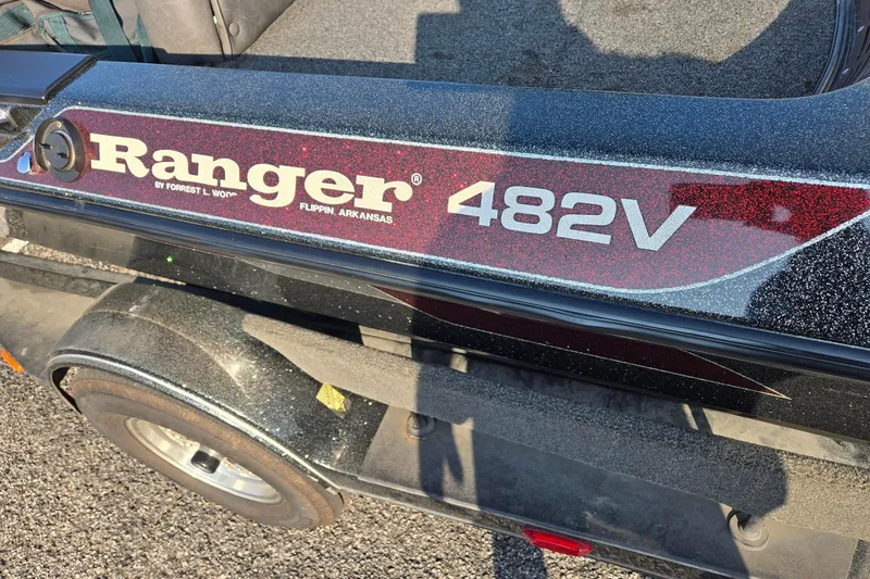 Slide: The Image of Boomeranger 482V boat trailer, 1993 model, with red and black detailing. - 6