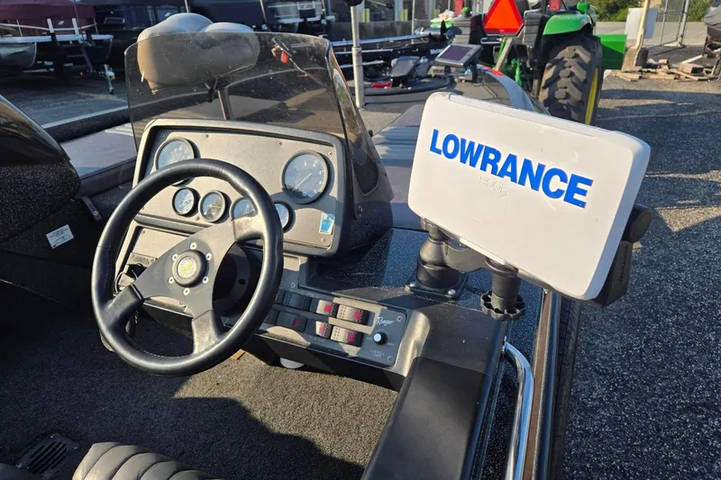 Slide: The Image of Cockpit of 1993 Boomeranger 482V boat with Lowrance navigation system. - 8