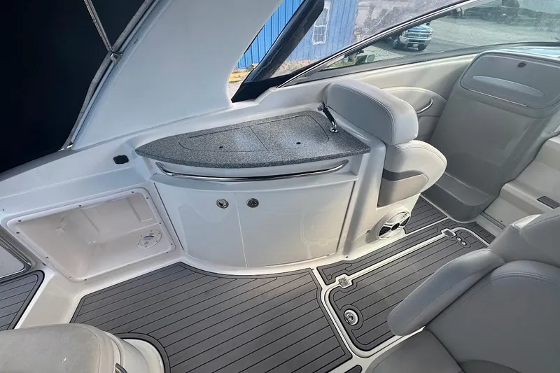 Slide: The Image of Interior of 2010 Chaparral 275 SSi boat with sleek seating and modern design. - 5