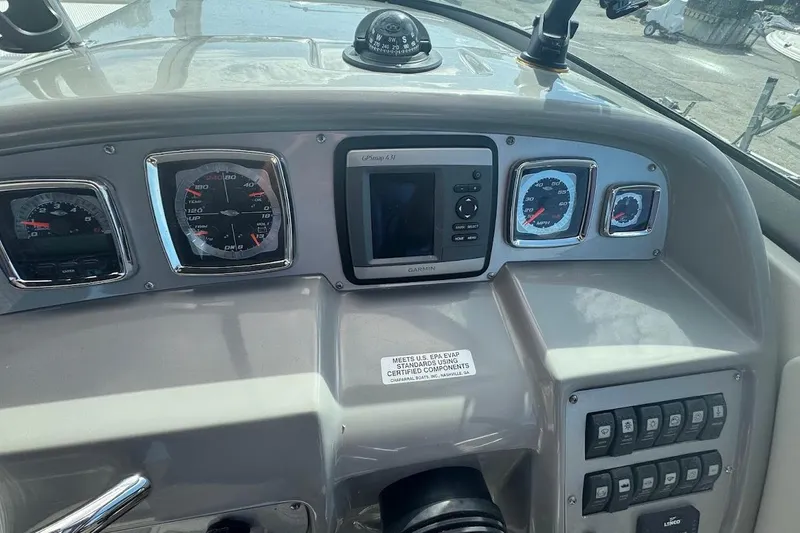 Slide: The Image of Dashboard of a 2010 Chaparral 275 SSi boat with gauges and Garmin GPS. - 9