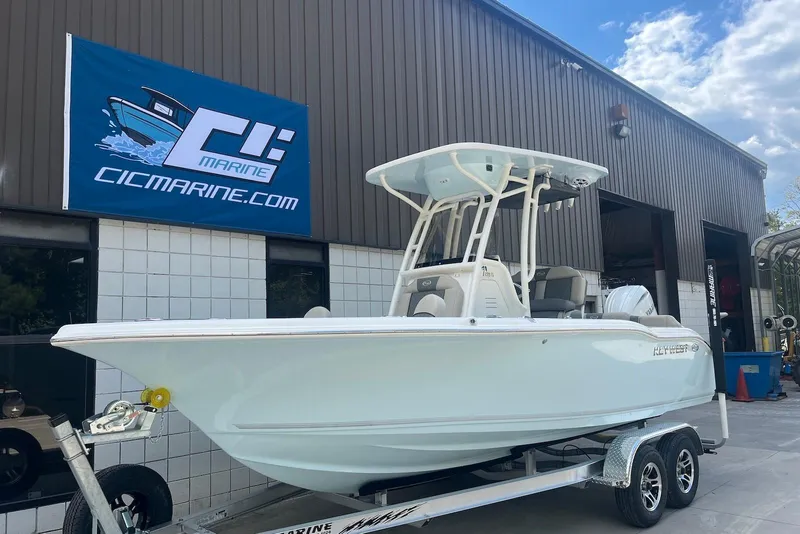 The Image of 2026 Key West 219 FS boat on trailer at CIC Marine dealership. - 0