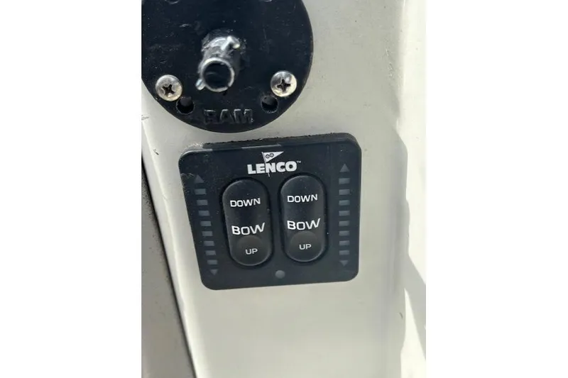 Slide: The Image of Lenco trim tab control panel on 2005 Stingray 220 DR boat. - 10