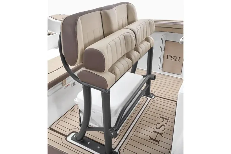 Slide: The Image of 2026 Yamaha Boats 255 FSH Sport E interior with cushioned seating and FSH branding. - 3
