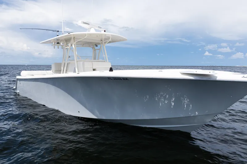 The Image of 2017 SeaVee 370z boat on open water under cloudy sky. - 0