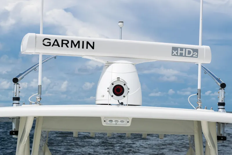 Slide: The Image of Garmin xHD2 radar on 2017 SeaVee 370z boat against a cloudy sky. - 19