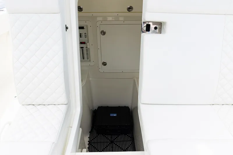 Slide: The Image of Interior view of a 2017 SeaVee 370z boat with white quilted seating. - 20