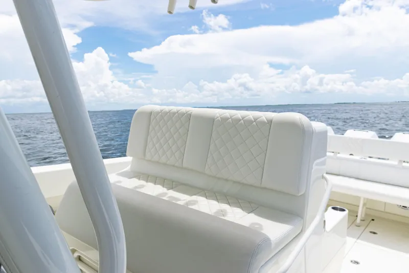 Slide: The Image of Luxurious seating on a 2017 SeaVee 370z boat with ocean view and blue sky. - 21