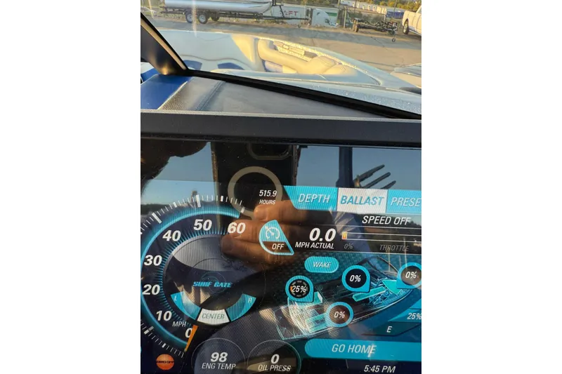 Slide: The Image of Dashboard of a 2016 Malibu Wakesetter 25 LSV boat showing speed and settings. - 6