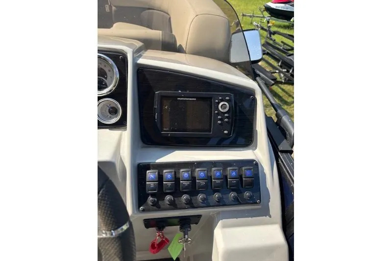 Slide: The Image of 2023 Sylvan Mirage X X3 dashboard with control panel and navigation system. - 11