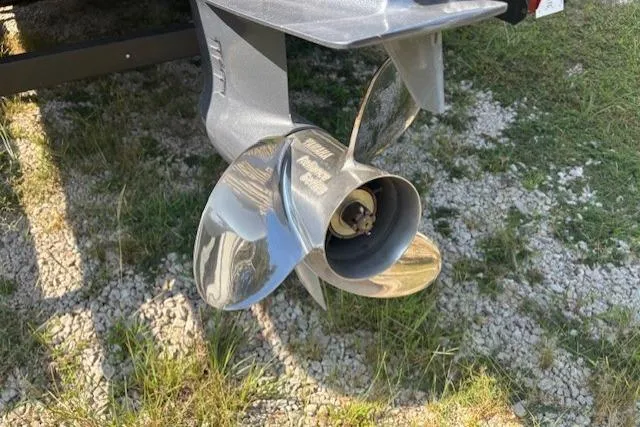 Slide: The Image of 2023 Sylvan Mirage X X3 boat propeller on grassy terrain. - 17