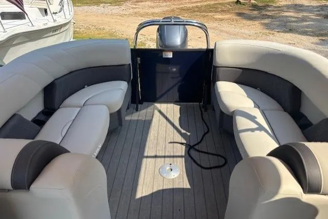 Slide: The Image of 2023 Sylvan Mirage X X3 pontoon boat interior with spacious seating and modern design. - 6