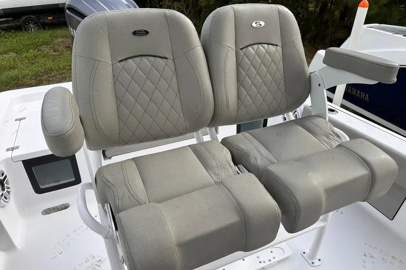 Slide: The Image of 2025 Sportsman Masters 247OE Bay Boat seats with diamond stitching and armrests. - 35