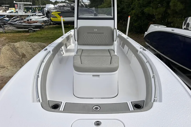 Slide: The Image of 2025 Sportsman Masters 247OE Bay Boat with cushioned seating and sleek design. - 8