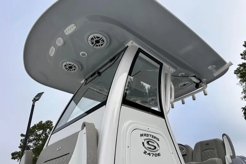 Slide: The Image of 2025 Sportsman Masters 247OE Bay Boat, featuring sleek design and advanced audio system. - 9