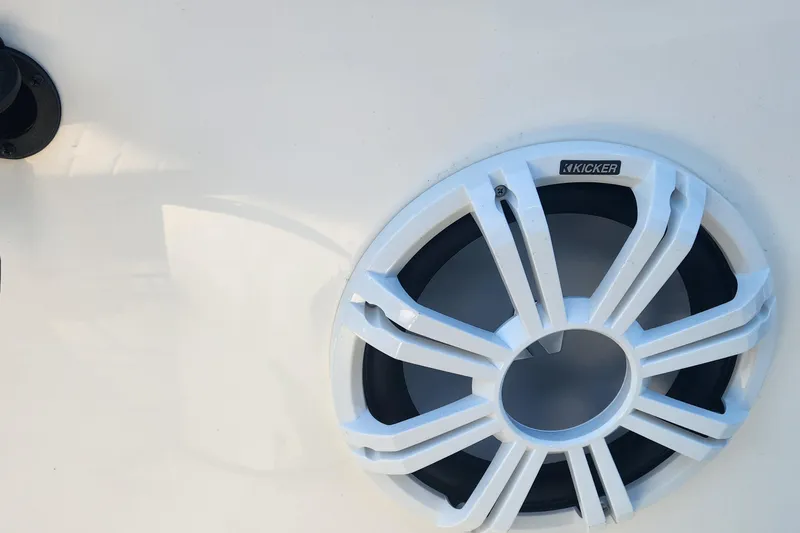 Slide: The Image of Close-up of a Kicker speaker on a 2022 Pioneer 222 Islander boat. - 20