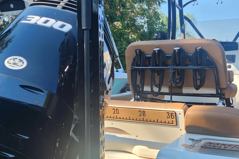 Slide: The Image of 2022 Pioneer 222 Islander boat with powerful 300 engine and organized seating. - 4