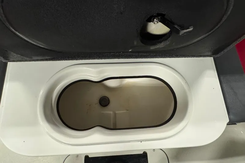 Slide: The Image of Open storage compartment in a 2008 Ranger 1850 Reata boat. - 15