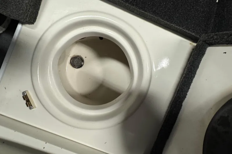 Slide: The Image of 2008 Ranger 1850 Reata boat interior detail with circular compartment. - 17