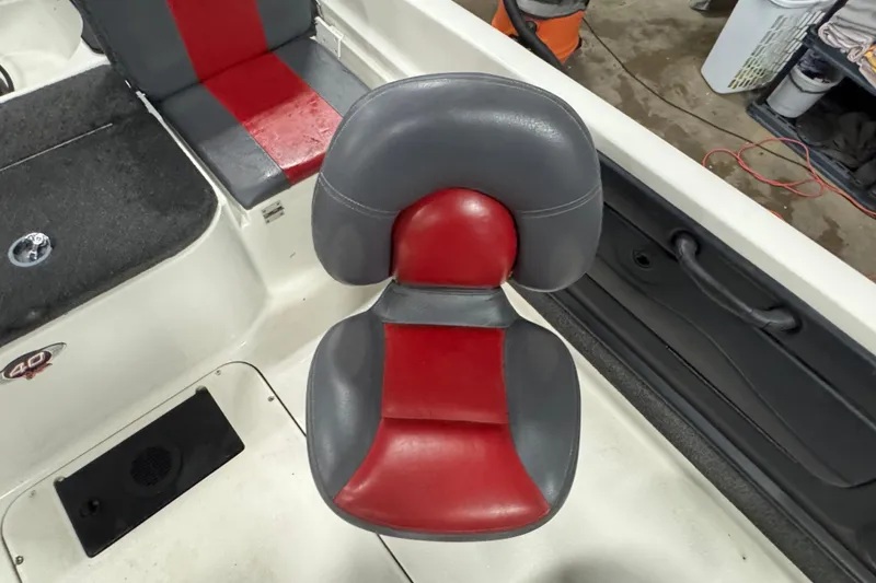 Slide: The Image of 2008 Ranger 1850 Reata boat seat with red and gray upholstery. - 5