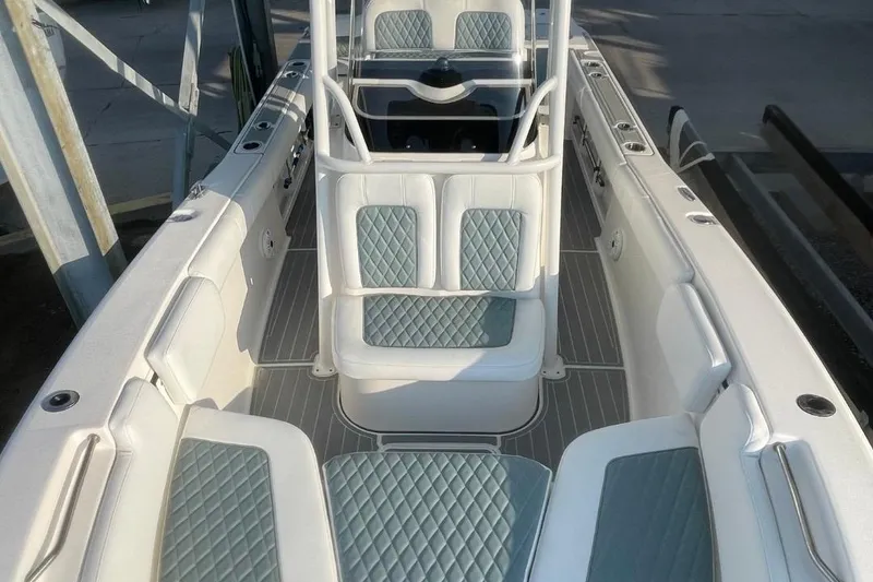 Slide: The Image of 2020 Sea Fox 248 Commander boat interior with cushioned seating and sleek design. - 6
