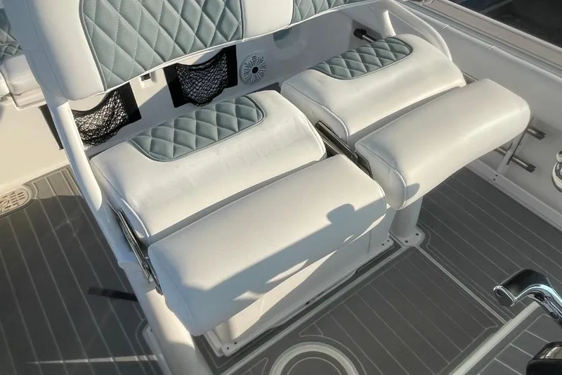 Slide: The Image of 2020 Sea Fox 248 Commander boat seating with quilted upholstery and storage nets. - 9