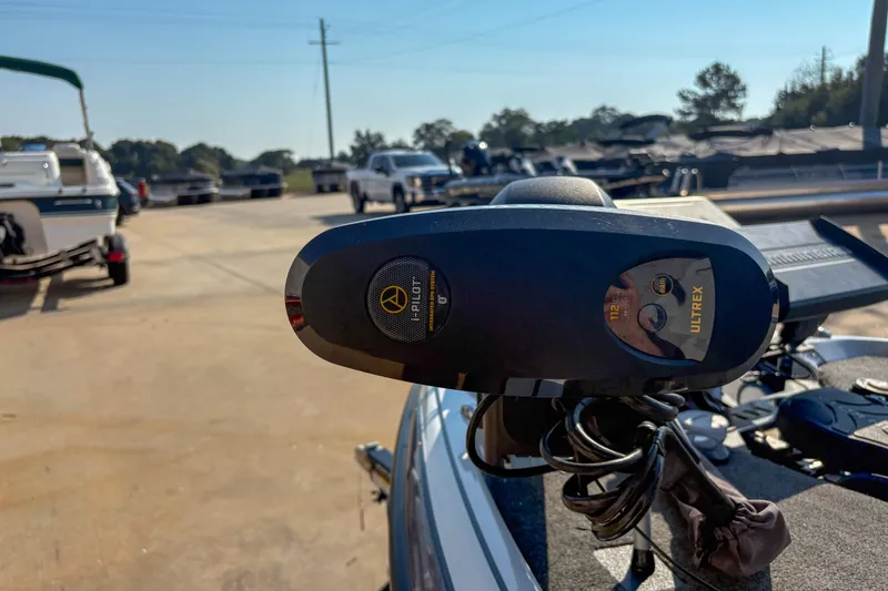 Slide: The Image of 2022 Skeeter FXR20 boat with Ultrex trolling motor in a parking lot. - 10