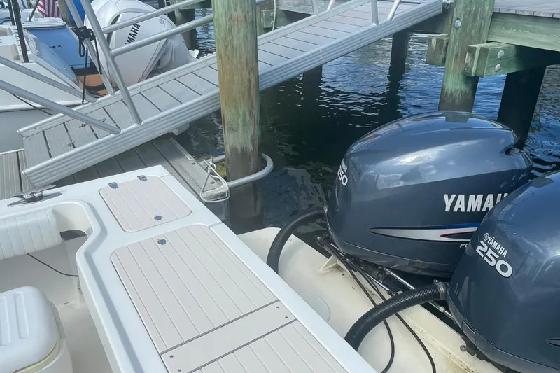 Slide: The Image of 2007 Parker 2820 XLD Sport Cabin with Yamaha 250 engines docked at marina. - 15