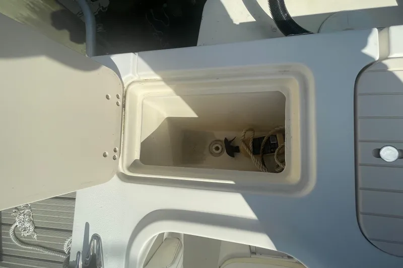 Slide: The Image of Open storage compartment on 2007 Parker 2820 XLD Sport Cabin boat. - 23