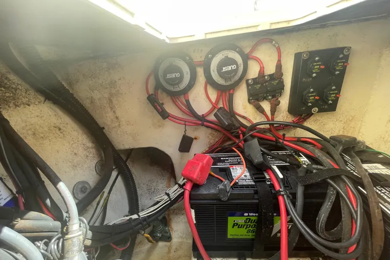 Slide: The Image of Electrical wiring and battery setup in a 2007 Parker 2820 XLD Sport Cabin boat. - 25