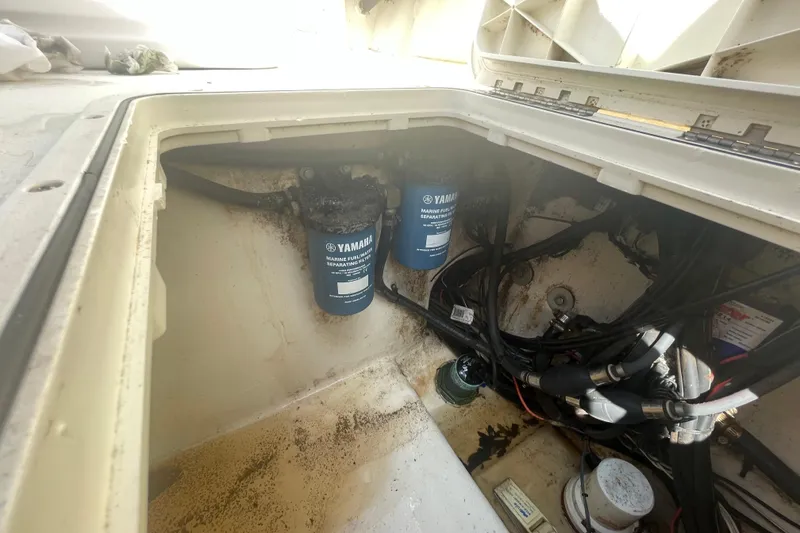 Slide: The Image of 2007 Parker 2820 XLD Sport Cabin engine compartment with Yamaha fuel filters. - 26