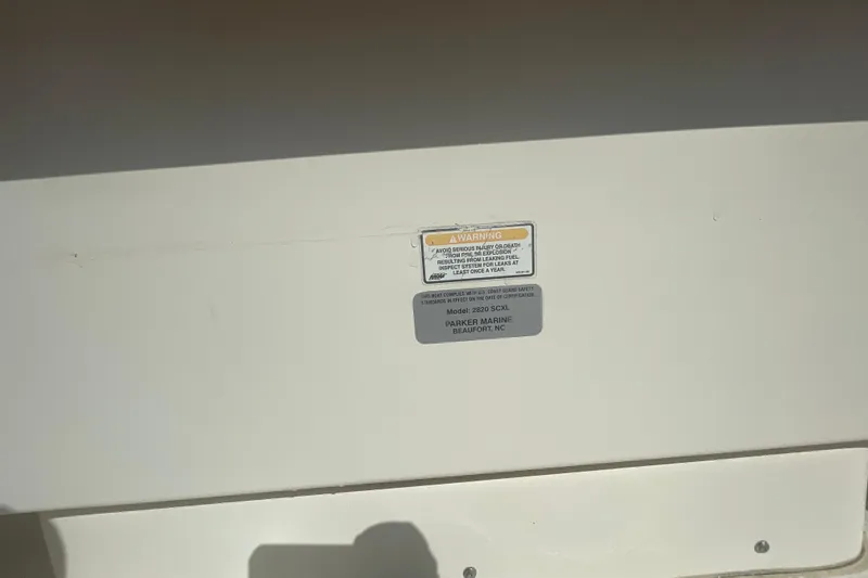 Slide: The Image of 2007 Parker 2820 XLD Sport Cabin warning label and model information plate. - 28