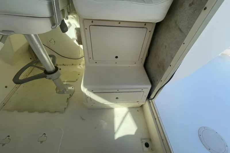 Slide: The Image of Interior of 2007 Parker 2820 XLD Sport Cabin, featuring seating and storage compartments. - 45