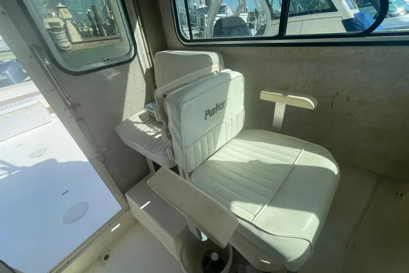 Slide: The Image of 2007 Parker 2820 XLD Sport Cabin interior with white seating and window view. - 47