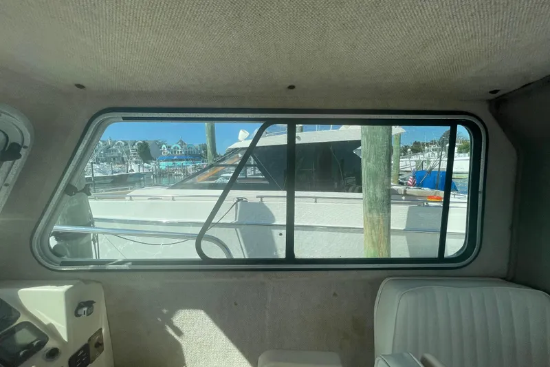 Slide: The Image of Interior view of a 2007 Parker 2820 XLD Sport Cabin boat window. - 51