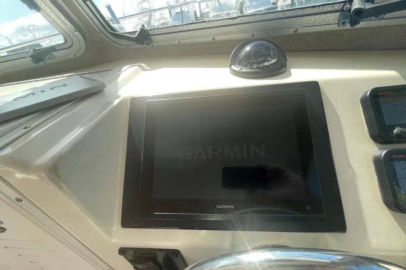 Slide: The Image of Garmin display on 2007 Parker 2820 XLD Sport Cabin boat dashboard. - 56