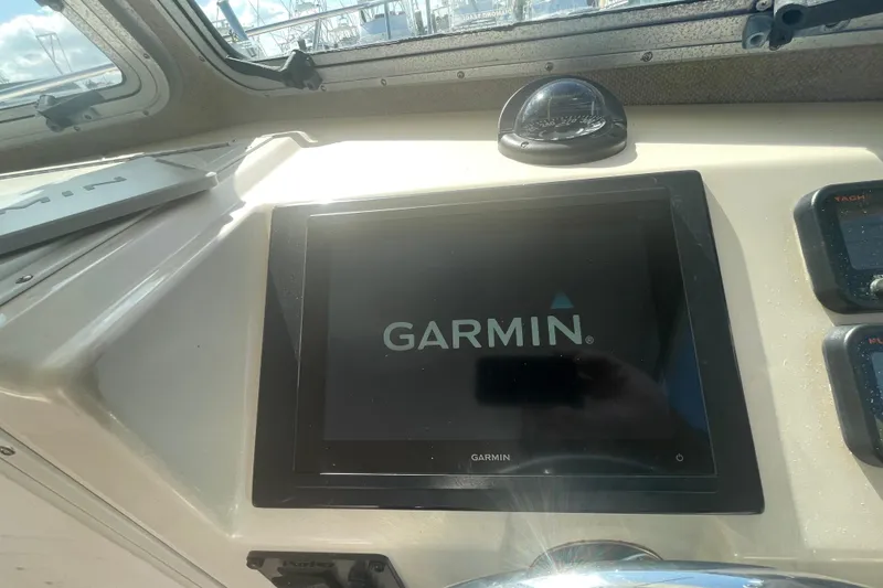 Slide: The Image of Garmin display on 2007 Parker 2820 XLD Sport Cabin boat dashboard. - 57