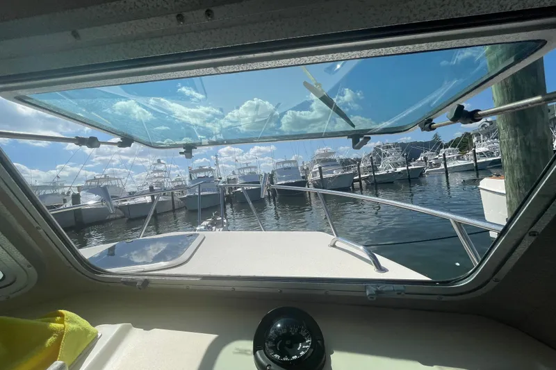 Slide: The Image of View from 2007 Parker 2820 XLD Sport Cabin, overlooking marina with boats and clear sky. - 64