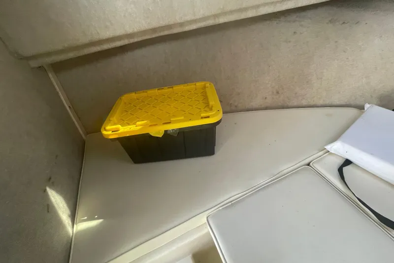 Slide: The Image of Interior of 2007 Parker 2820 XLD Sport Cabin with storage box and cushion. - 69