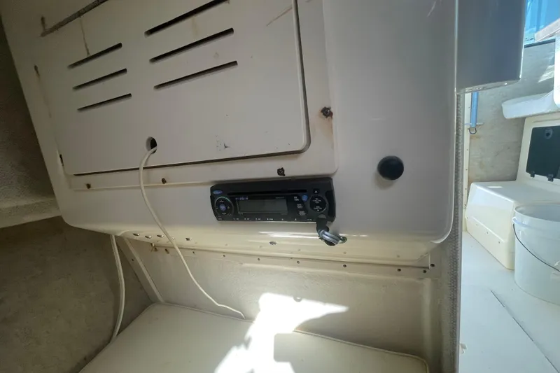 Slide: The Image of Interior of 2007 Parker 2820 XLD Sport Cabin with radio and storage compartment. - 72