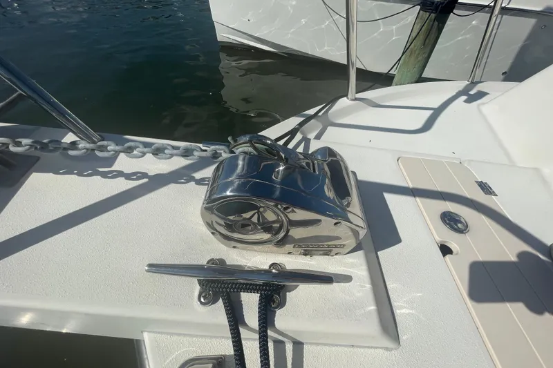 Slide: The Image of Anchor winch on 2007 Parker 2820 XLD Sport Cabin boat deck by the water. - 87
