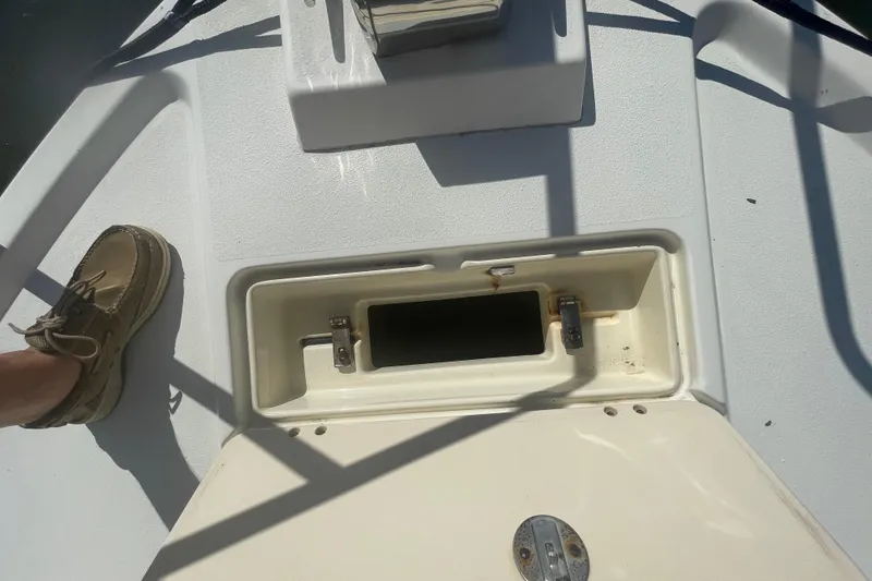 Slide: The Image of 2007 Parker 2820 XLD Sport Cabin deck with open storage compartment. - 88