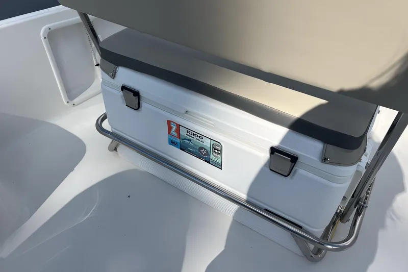 Slide: The Image of 2026 Key West 1720 Center Console boat with Igloo cooler under seat. - 14