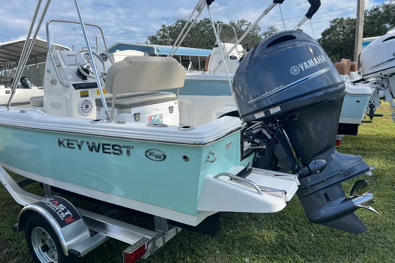 Slide: The Image of 2026 Key West 1720 Center Console boat with Yamaha outboard motor on display. - 2